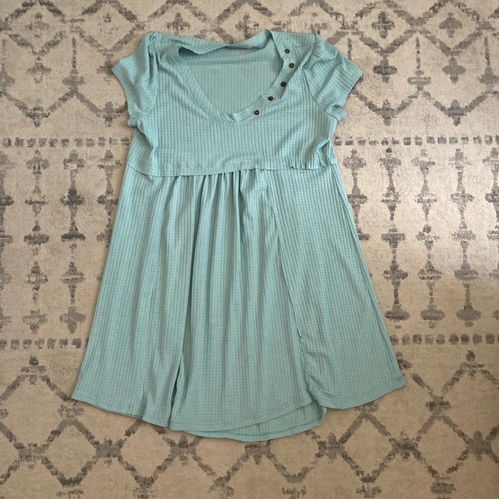 Asymmetrical dress with buttons and unique design. Super soft